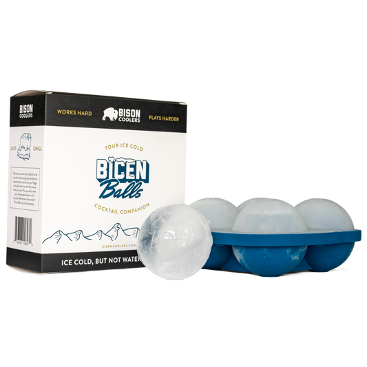 Ice ball mold by Bison Coolers with five clear ice spheres in blue tray.